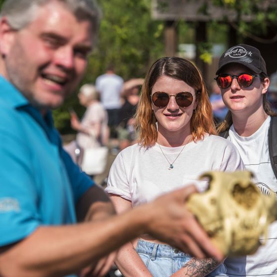 Couple Watching A Ranger Talk
